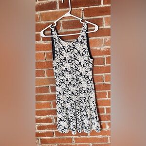 White and dark blue lacy patterned dress.